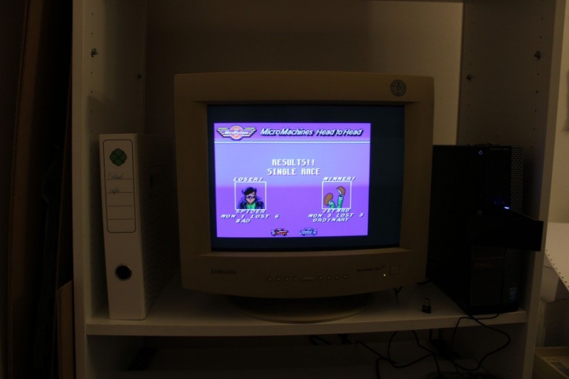 Picture of a CRT monitor with the game Micromachines.